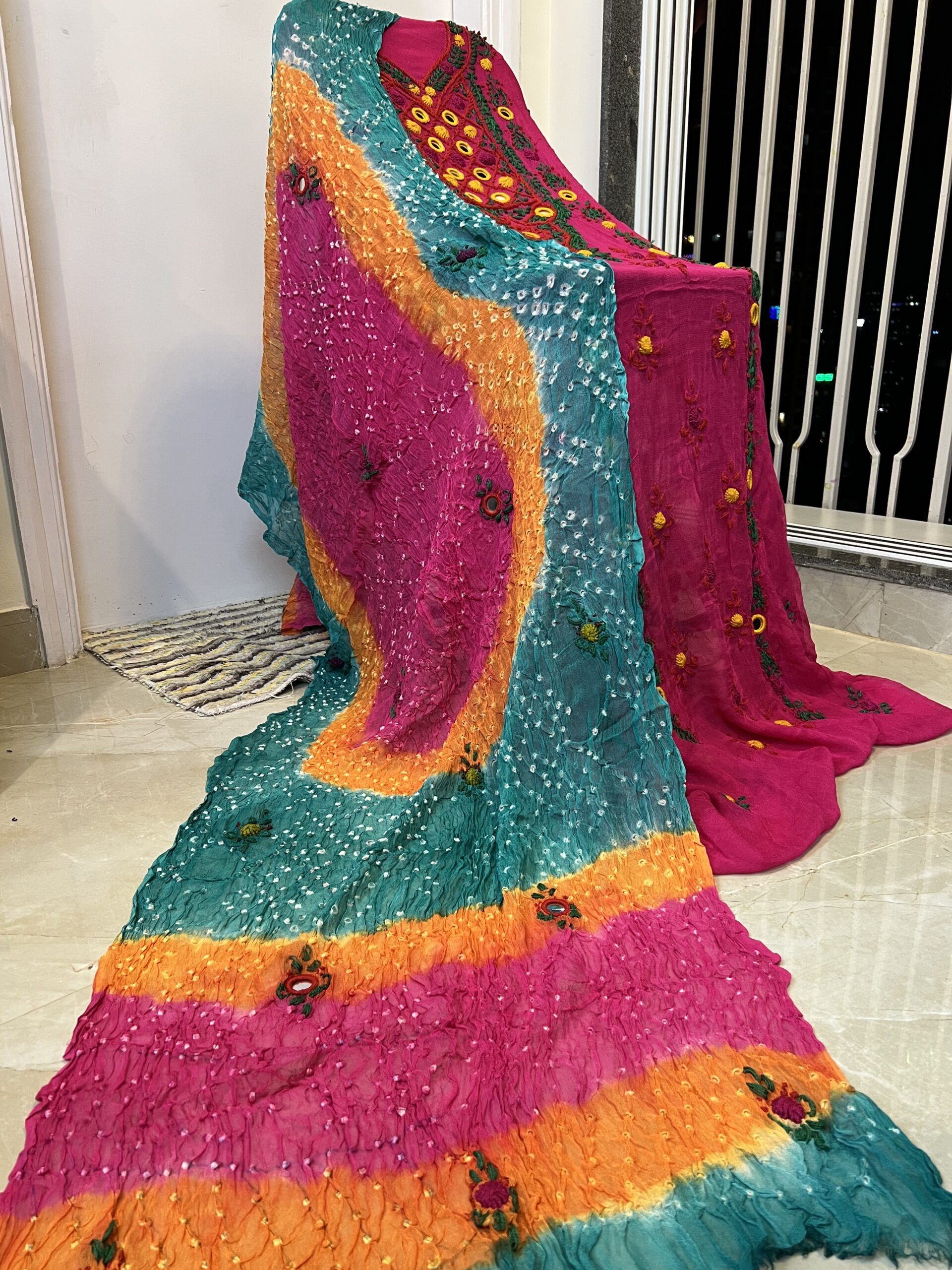 baandni suit in pink colour with multi colour duppatta